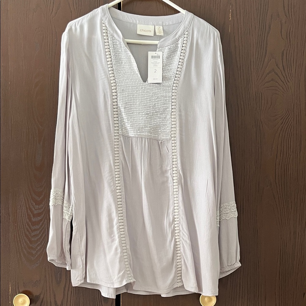 Chico long sleeved light gray top with sequins and cotton trim. Size Chico 2 NWT